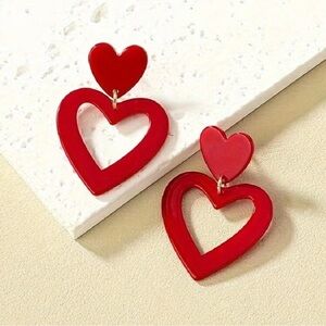 Heart ♥️ Shaped acrylic earrings.